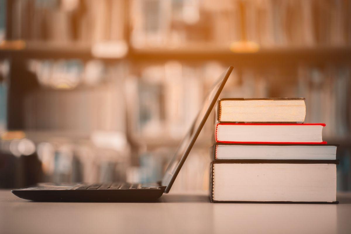 Bookshelves and laptops in library